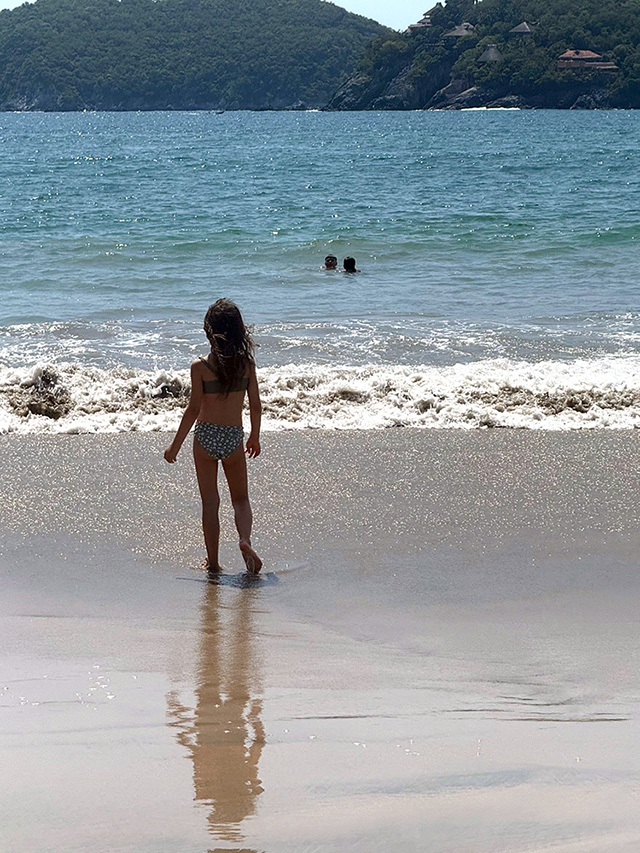 Girl at a beach. I want the world to live in peace.